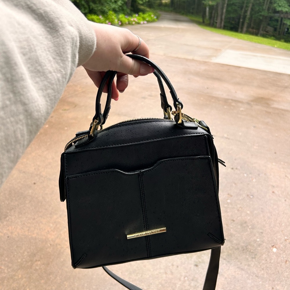 Black Steve Madden handbag with gold hardware
